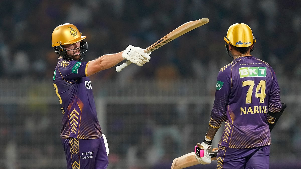 Kolkata Knight Riders' Phil Salt, left, celebrates scoring fifty runs during the Indian Premier League cricket match between Delhi Capitals and Kolkata Knight Riders in Kolkata. - AP Photo/Bikas Das