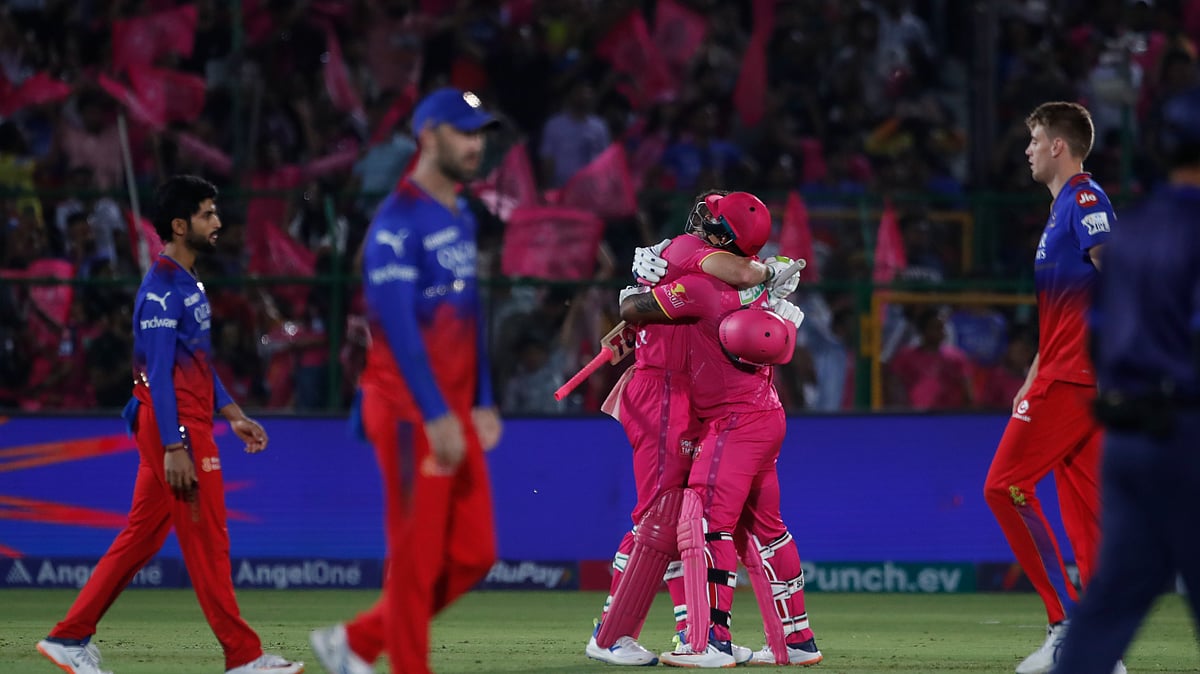 Rajasthan Royals' Jos Buttler and Shimron Hetmyer celebrate their win over Royal Challengers Bengaluru in the Indian Premier League match between Rajasthan Royals and Royal Challengers Bengaluru in Jaipur. - AP Photo/Pankaj Nangia