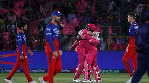 AP Photo/Pankaj Nangia : Rajasthan Royals' Jos Buttler and Shimron Hetmyer celebrate their win over Royal Challengers Bengaluru in the Indian Premier League match between Rajasthan Royals and Royal Challengers Bengaluru in Jaipur.