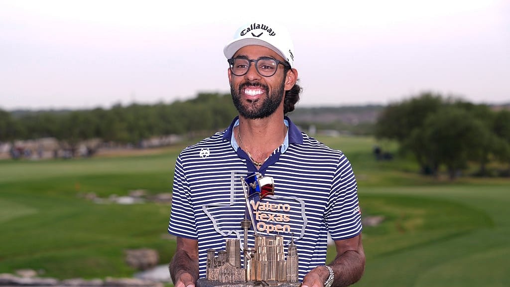Akshay Bhatia holds his trophy after winning the Texas Open golf tournament on April 7, 2024, in San Antonio. - AP