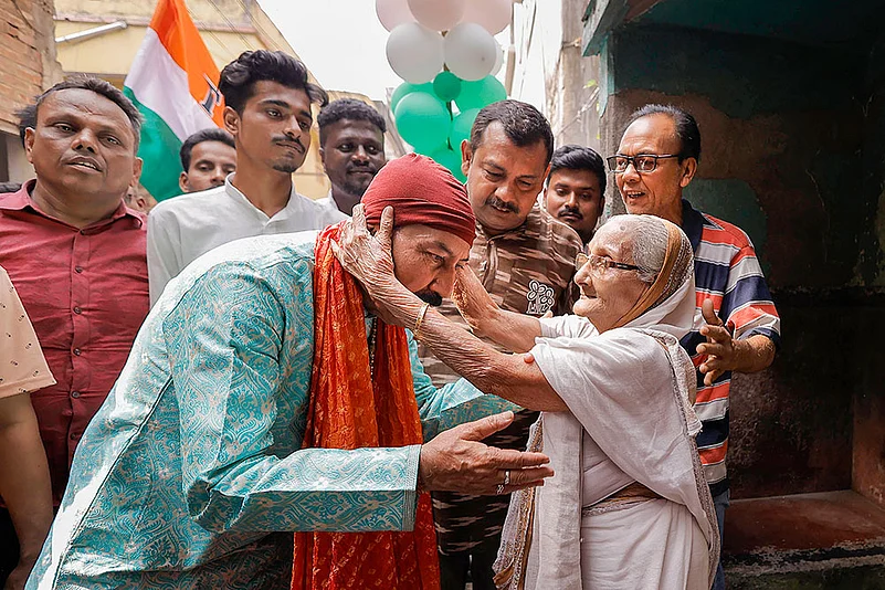 TMC candidate Prasun Banerjee campaigns