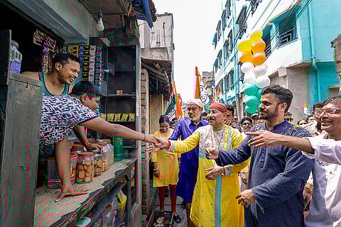 TMC candidate Prasun Banerjee campaigns