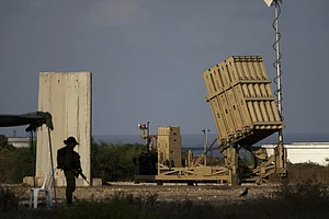 AP : A battery of Israel’s Iron Dome defence missile system |