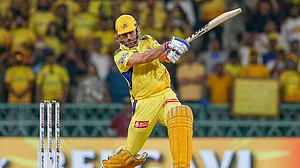 AP/Surjeet Yadav : Chennai Super Kings' MS Dhoni hits a boundary during the Indian Premier League cricket match between Chennai Super Kings and Lucknow Super Giants in Lucknow, India, Friday, April 19, 2024.