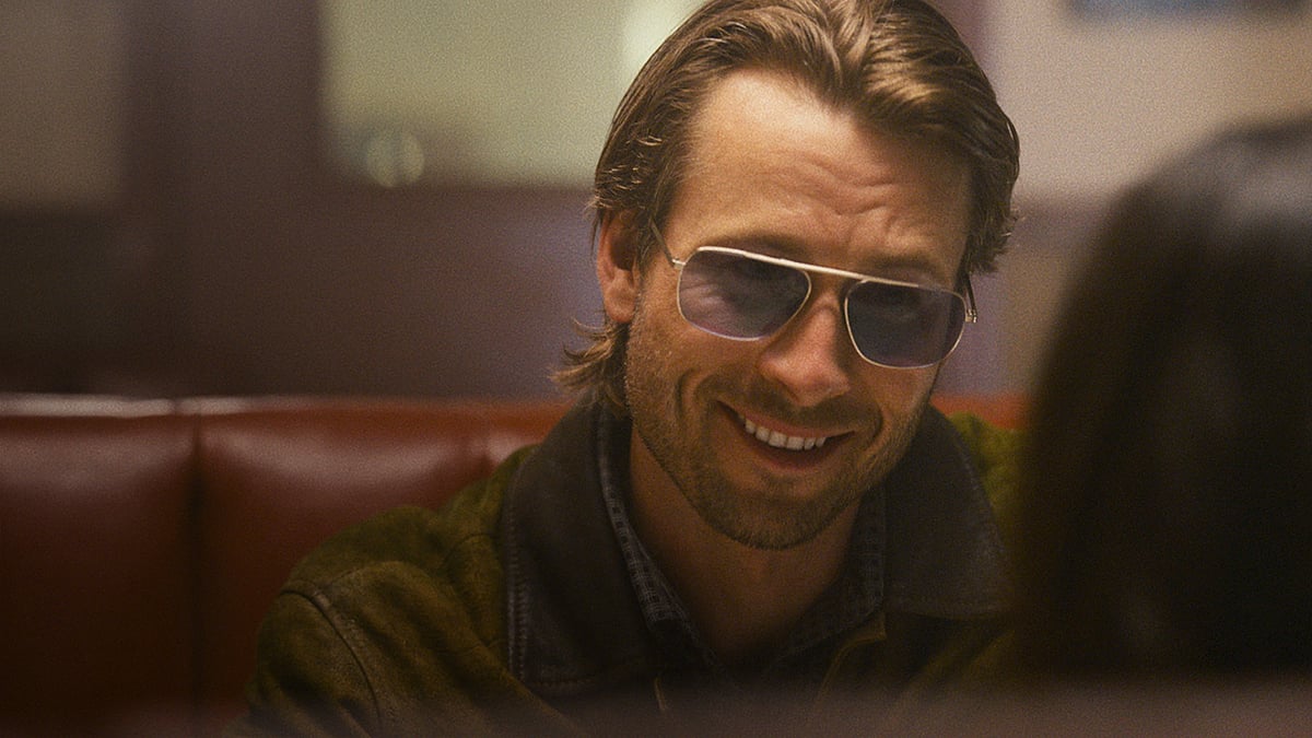 YouTube : Glen Powell In A Still From ‘Hit Man’