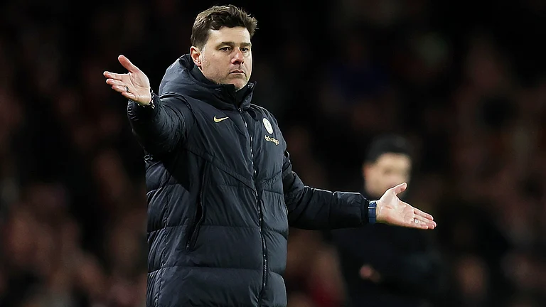 Mauricio Pochettino looks on during Chelsea's 5-0 defeat. - null