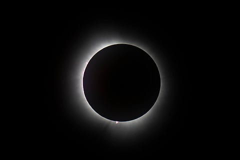The moon covers the sun during a total solar eclipse as seen from Wooster, Ohio.