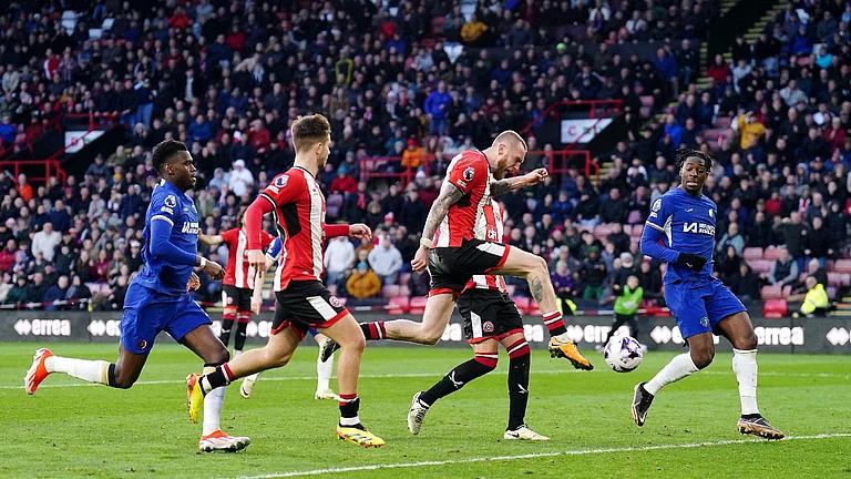 Oli McBurnie (centre) scores Sheffield United’s equaliser. - (Mike Egerton/PA)