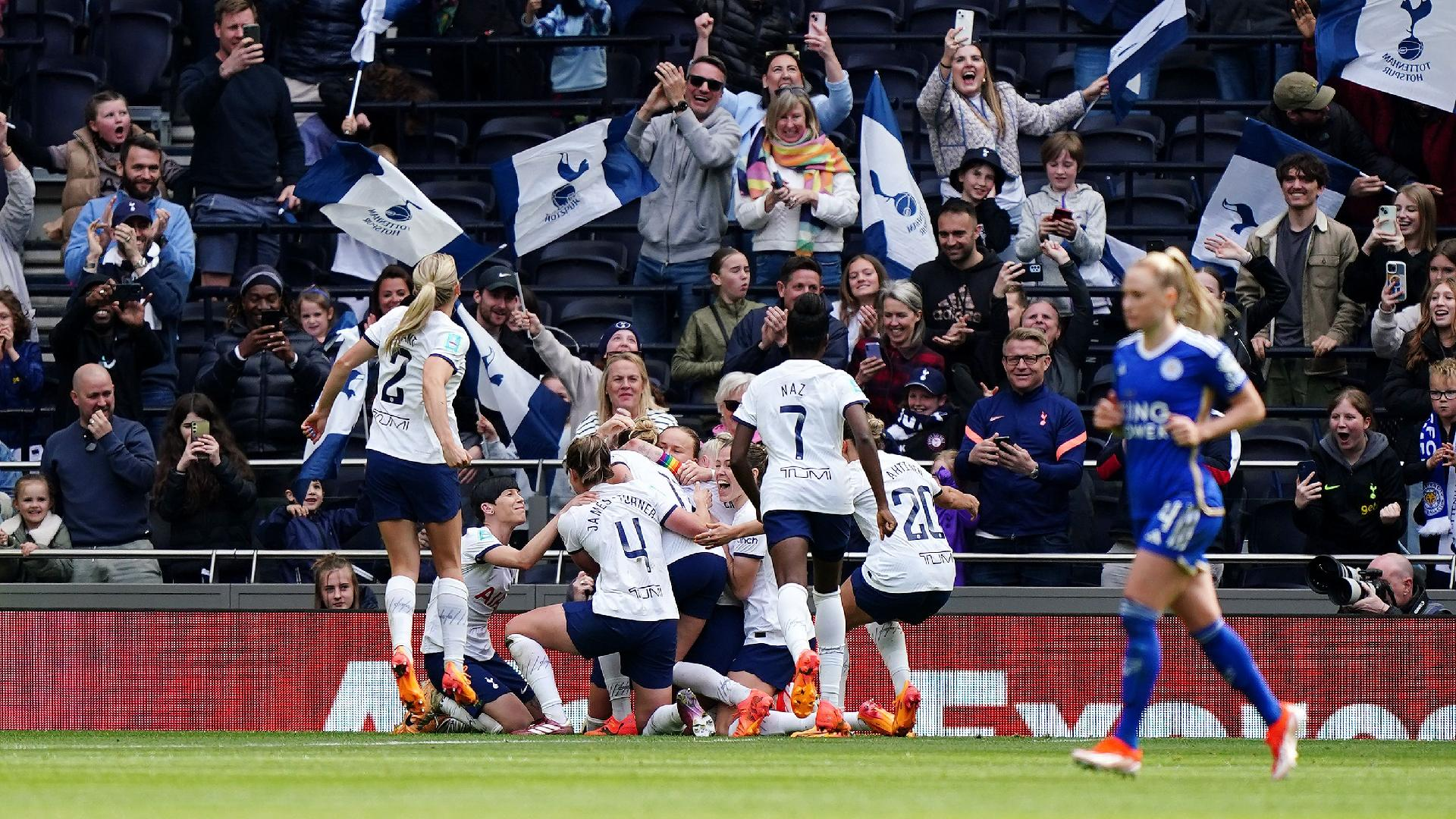 Zac Goodwin/PA : Martha Thomas is bundled by her Tottenham team-mates after her goal beat Leicester to send them through to the Women’s FA Cup final.