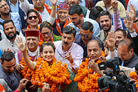 PTI Photo : BJP candidate Kangana Ranaut and former CM Jai Ram Thakur in Mandi, April 1, 2024