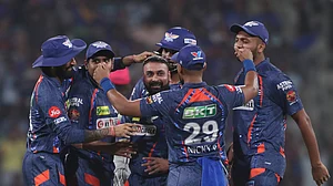 AP Photo/Pankaj Nangia : Lucknow Super Giants' Amit Mishra celebrates the wicket of Rajasthan Royals' Riyan Parag during the Indian Premier League cricket match between Rajasthan Royals and Lucknow Super Giants in Lucknow.