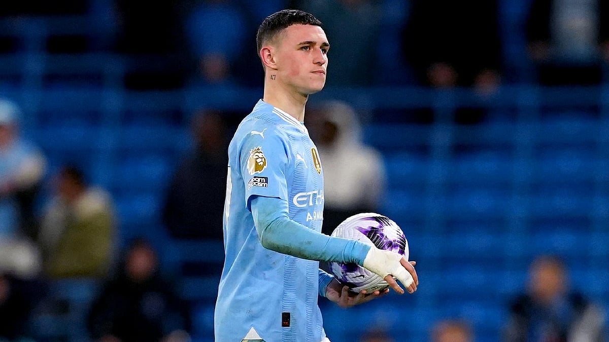  Photo: Martin Rickett/PA : Phil Foden went home with the match ball.