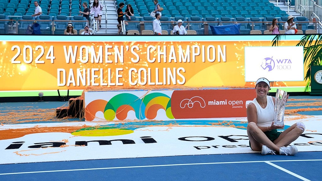 (AP Photo/Lynne Sladky) : Danielle Collins poses with her trophy after defeating Elena Rybakina, of Kazakhstan, in the women's singles final of the Miami Open tennis tournament, Saturday, March 30, 2024, in Miami Gardens, Fla. 
