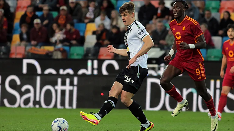 Udinese's Jaka Bijol plays against Roma during a Serie A soccer match between Udinese and Roma in Udine, northeastern Italy. - AP