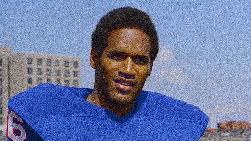 Photo: AP : File photo of American football titan OJ Simpson in his playing days, representing Buffalo Bills in 1969.