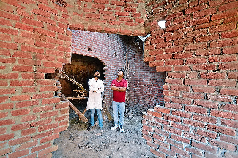 Remains of Mohd Mosam’s house in Kutba-Kutbi village that was destroyed in 2013