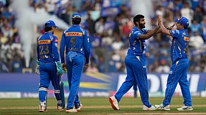 AP Photo/ Rafiq Maqbool : Mumbai Indians' Jasprit Bumrah, second from right, celebrates the dismissal of Delhi Capitals' Prithvi Shaw during the Indian Premier League cricket match between Mumbai Indians and Delhi Capitals in Mumbai.