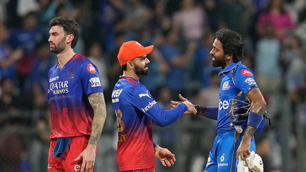 IPL 2024: MI defeated RCB by seven wickets. - AP/Rajanish Kakade