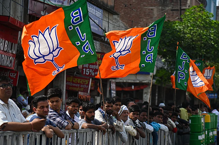 People are waiting for the arrival of Indian Prime Minister Narendra Modi during a roadshow ahead of the Indian General Elections in Ghaziabad, Uttar Pradesh, India, on April 6, 2024.  - (Photo by Kabir Jhangiani via Getty Images)