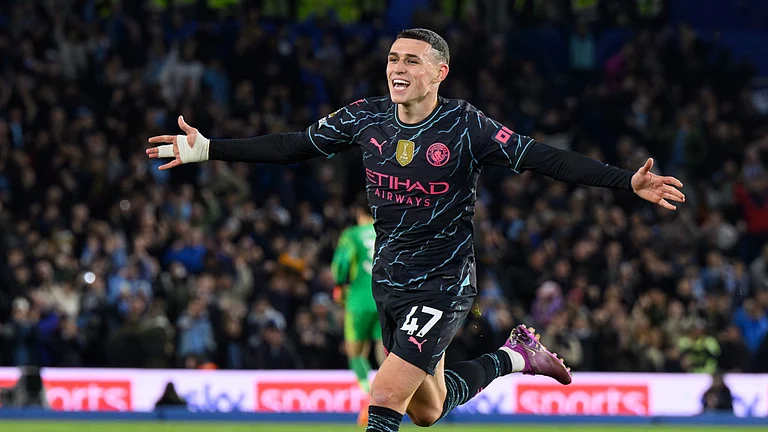 Phil Foden celebrates against Brighton. - null