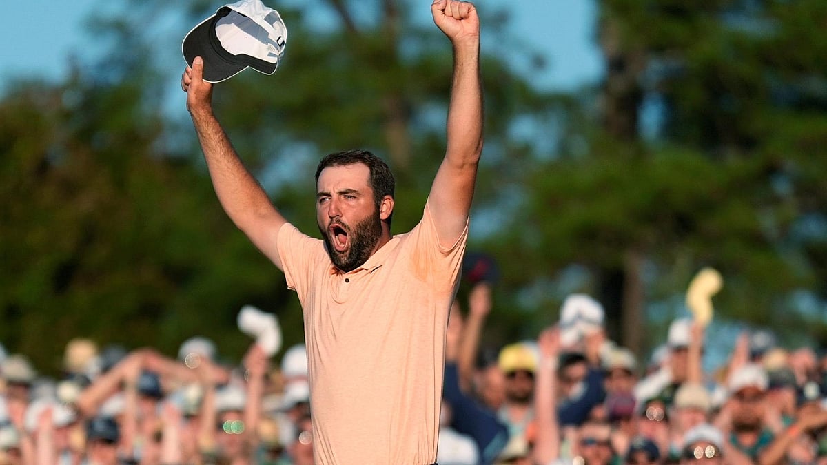 Ashley Landis/AP : Scottie Scheffler celebrates his win at the Masters golf tournament at Augusta National Golf Club.