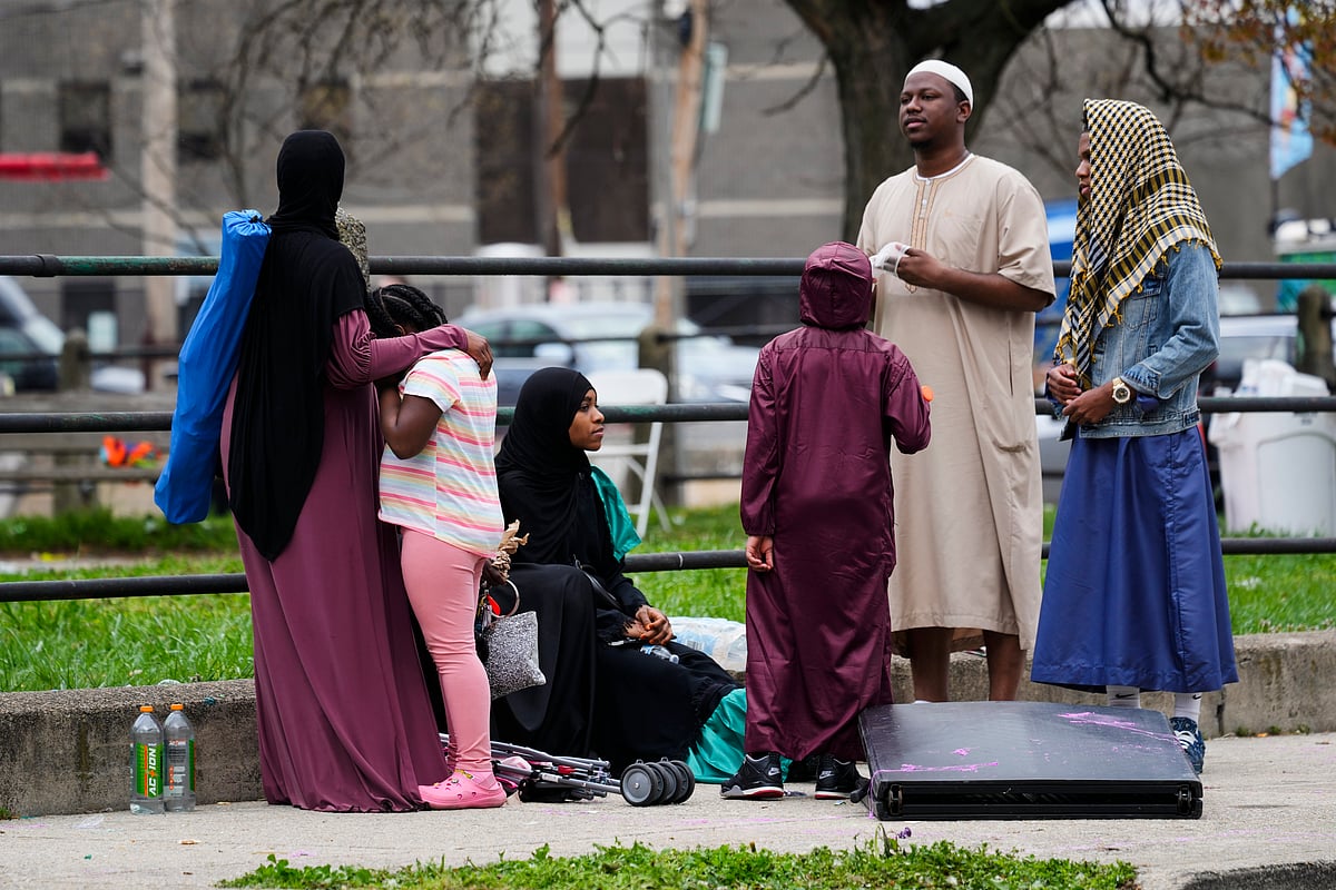 People gather in the aftermath of a shooting at an Eid al-Fitr event in Philadelphia, Wednesday, April 10, 2024.  - AP