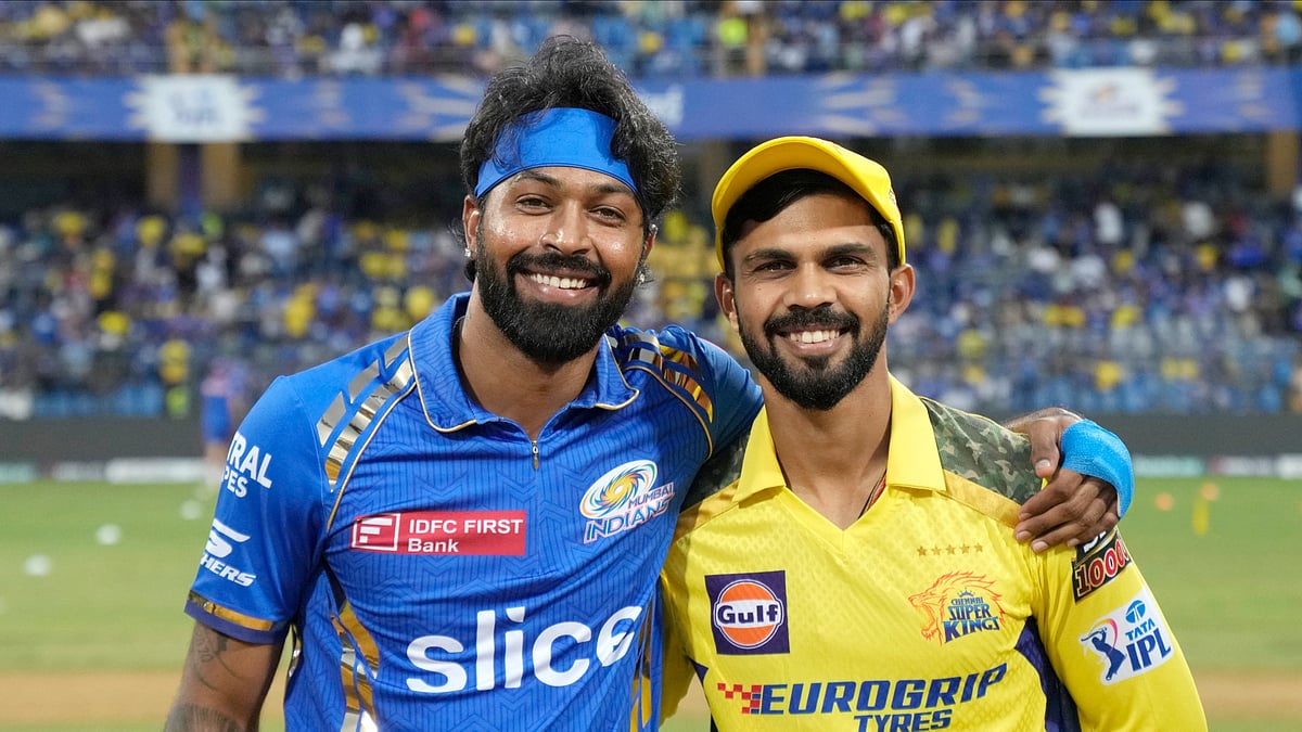 Photo: X/ @IPL : MI's skipper Hardik Pandya (L) with CSK's captain Ruturaj Gaikwad during toss time in IPL 2024.