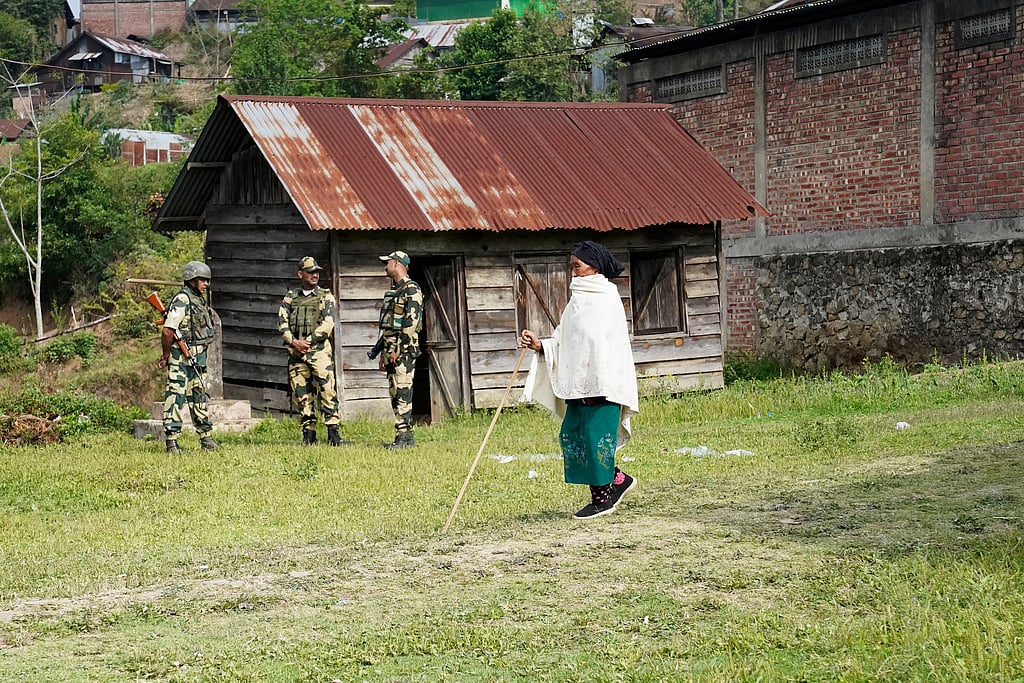 AP : An elderly woman arrives at a polling station to cast her vote in Shangshak village, in the northeastern Indian state of Manipur, Friday, April 26, 2024.