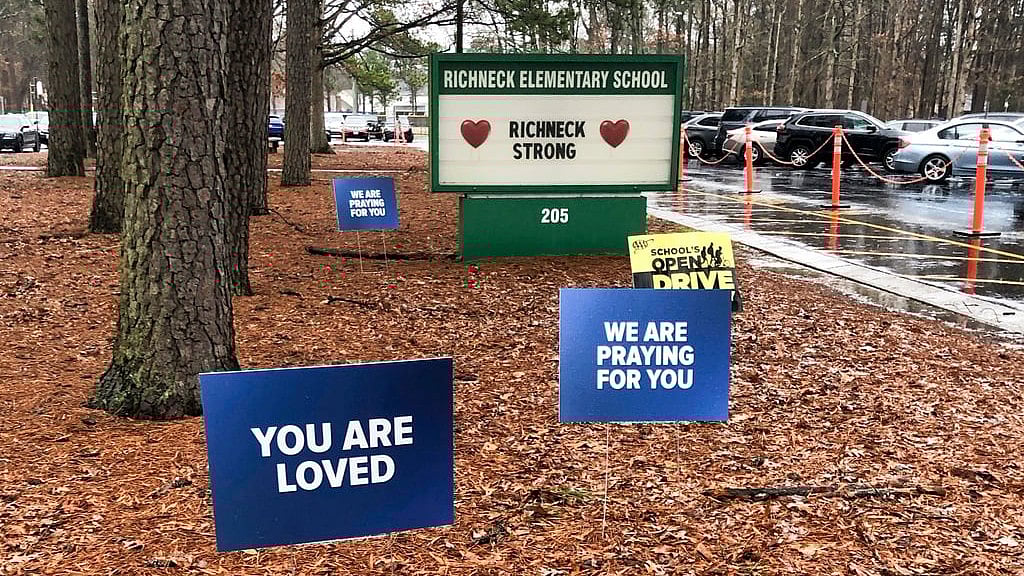 Signs stand outside Richneck Elementary School in Newport News, Va., Jan. 25, 2023.  - AP