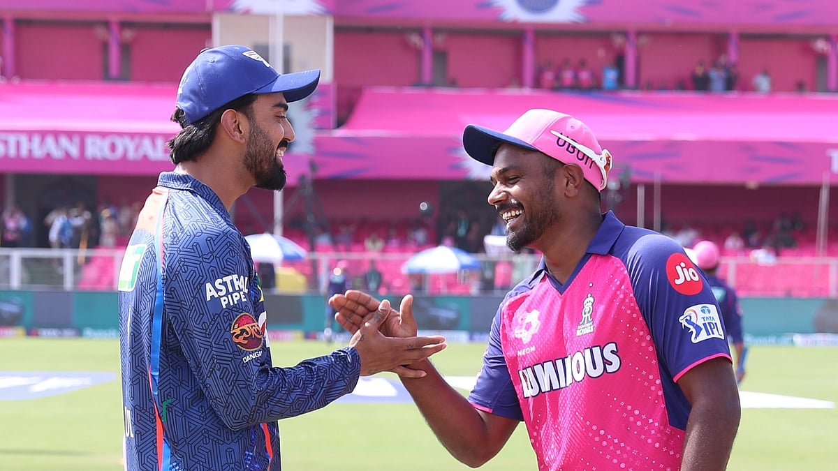 Photo: X/@IPL : LSG captain KL Rahul (L) with RR captain Sanju Samson during to toss in IPL 2024.