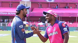 Photo: X/@IPL : LSG captain KL Rahul (L) with RR captain Sanju Samson during to toss in IPL 2024.