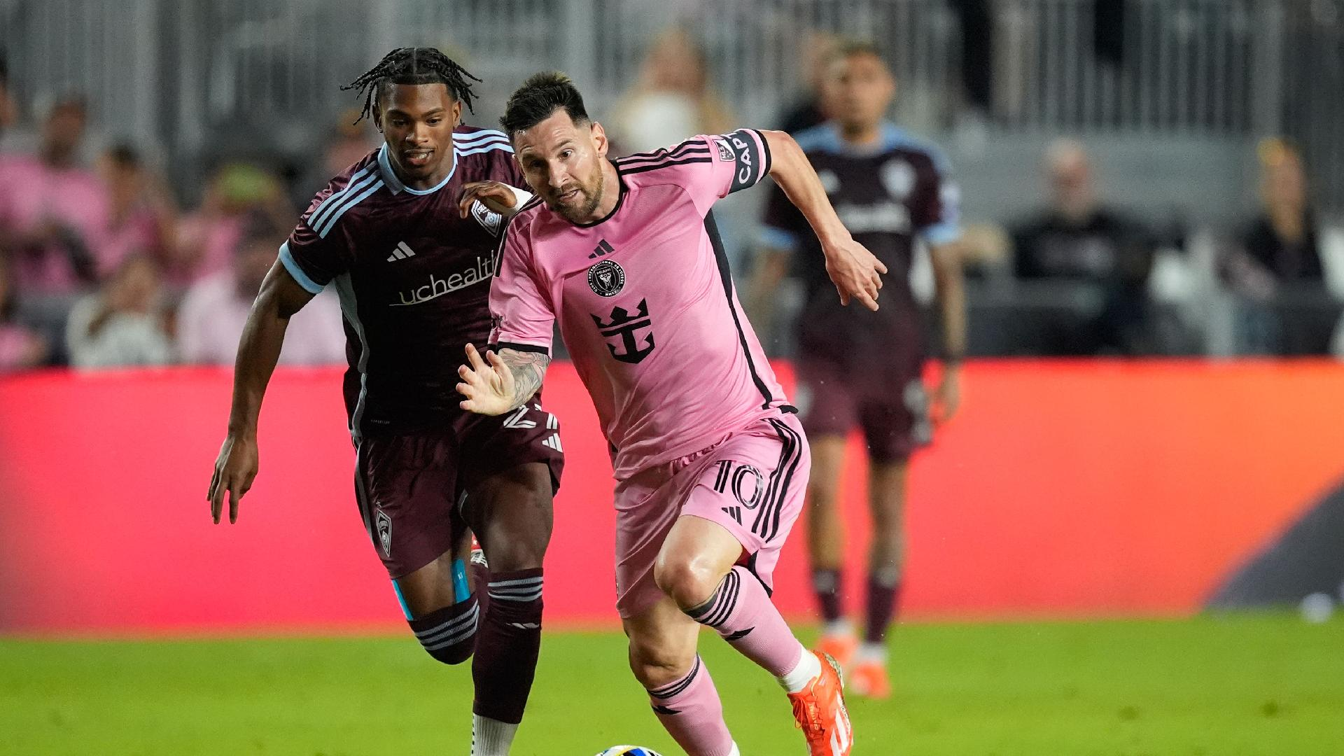 Rebecca Blackwell/AP : Inter Miami forward Lionel Messi vies with Colorado Rapids forward Kimani Stewart-Baynes.