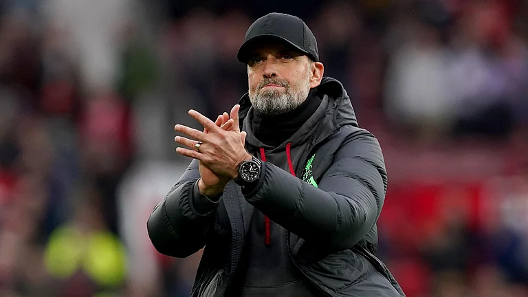 Jurgen Klopp is happy with Liverpool’s Premier League situation after the draw at Manchester United. - (Martin Rickett/PA)