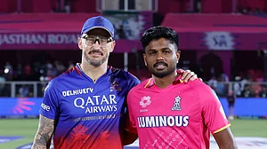 Photo: X/ @IPL : RCB captain Faf du Plessis (L) with RR's skipper Sanju Samson at the toss time in IPL 2024.