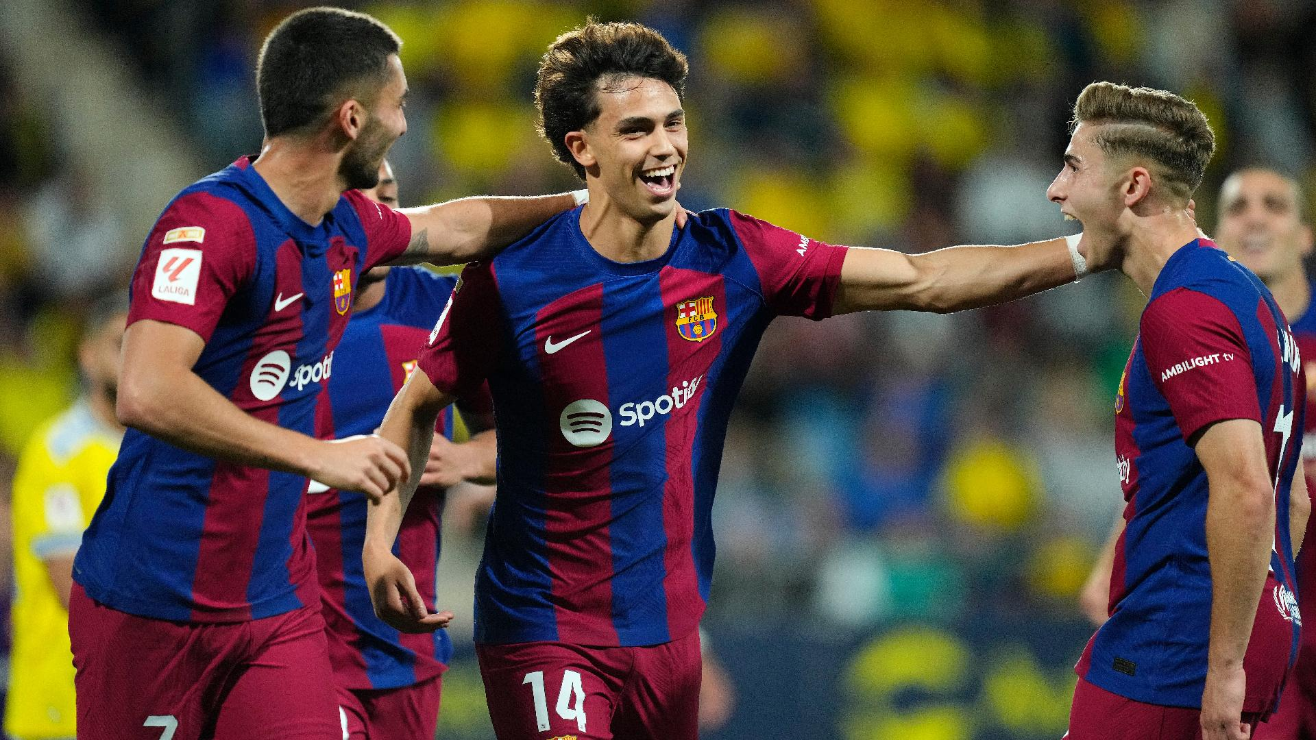 Barcelona’s Joao Felix, centre, is congratulated after his overhead kick gave his side the lead at Cadiz. - Jose Breton/AP