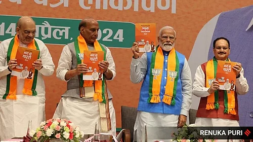 PTI%20%3A%20PM%20Modi%20unveils%20BJP%27s%20manifesto%20on%20Sunday%20along%20with%20Amit%20Shah%2C%20Rajnath%20Singh%20and%20J%20P%20Nadda%20%7C