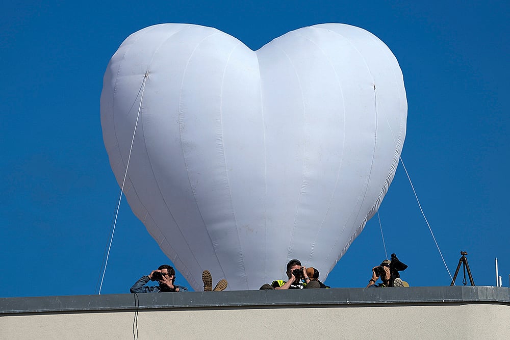 Security Observes From Roof