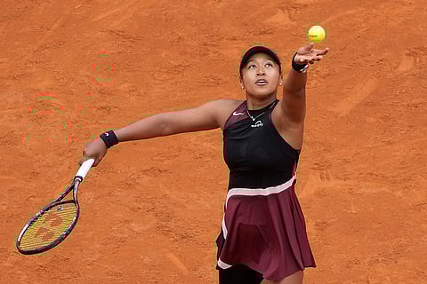 Naomi Osaka serves to Clara Borel