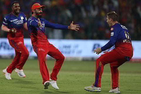 Virat Kohli celebrates the dismissal of Jake Fraser-McGurk