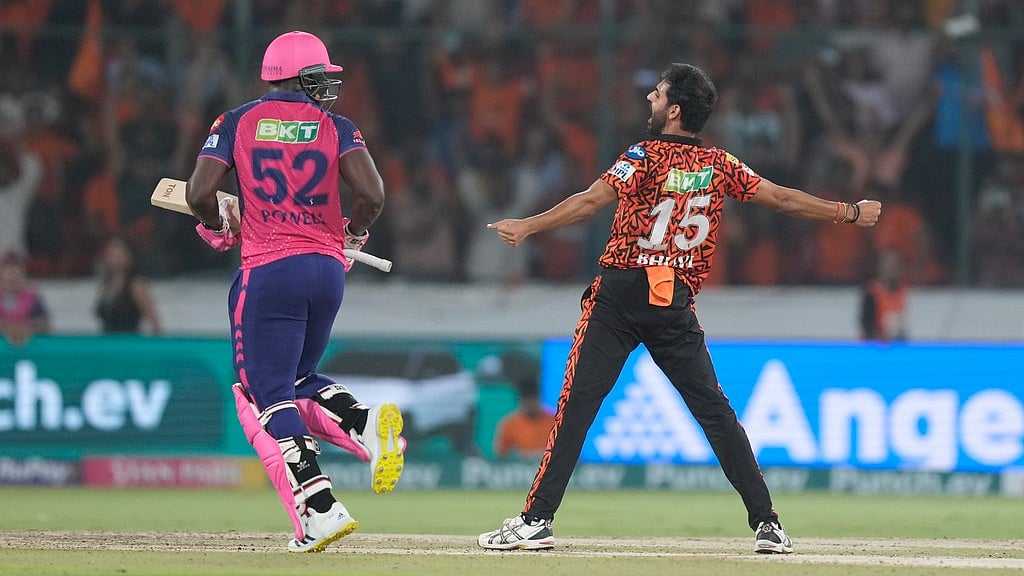SRH's Bhuvneshwar Kumar (R) celebrates against RR in match 50 of the IPL 2024. - AP