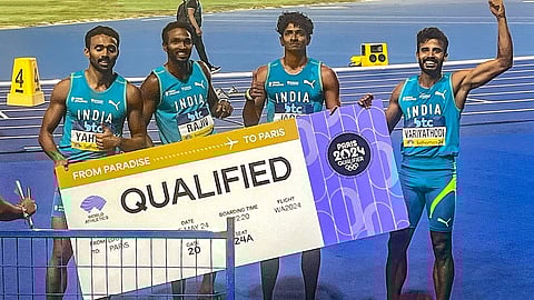Indian men's 4x400m relay team members Muhammed Anas Yahiya, Muhammed Ajmal, Arokia Rajiv and Amoj Jacob pose for photos after qualifying for Paris Olympics, at the World Athletics Relays, in Nassau, Bahamas, Monday, May 6, 2024.