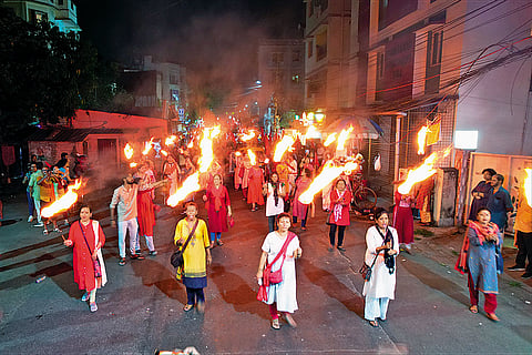CPI(M) members hold a night march