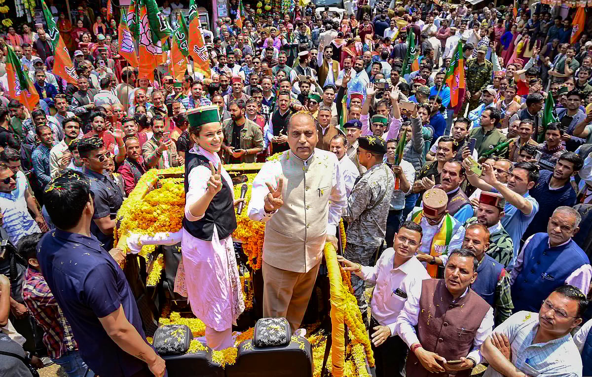 PTI : Former Himachal Pradesh CM Jairam Thakur with BJP candidate Kangana Ranaut during a rally.
