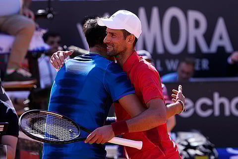 Novak Djokovic with Alejandro Tabilo
