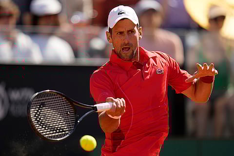 Djokovic returns the ball to Tabilo