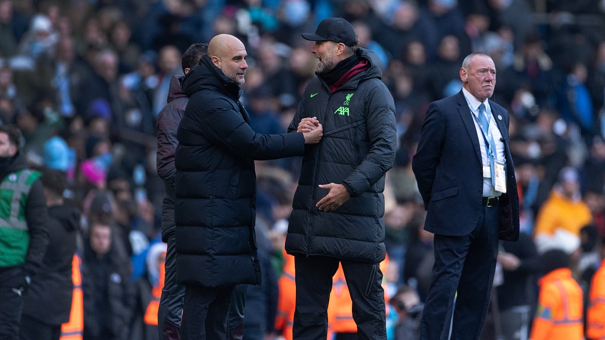Pep Guardiola thanked Jurgen Klopp for his influence. - null