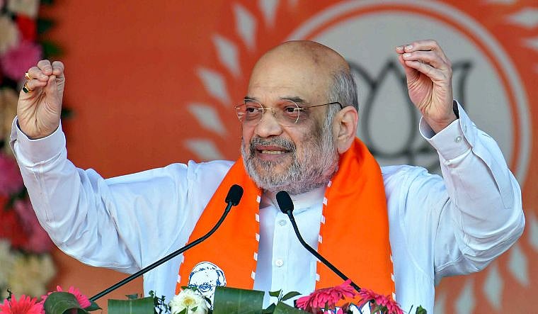 PTI : Amit Shah addressing a poll rally at Kanthi in East Midnapore district |