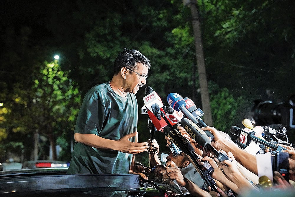 Photo: Animikh Chakrabarty : High Stakes: Arvind Kejriwal addresses a crowd outside his house after being released on interim bail