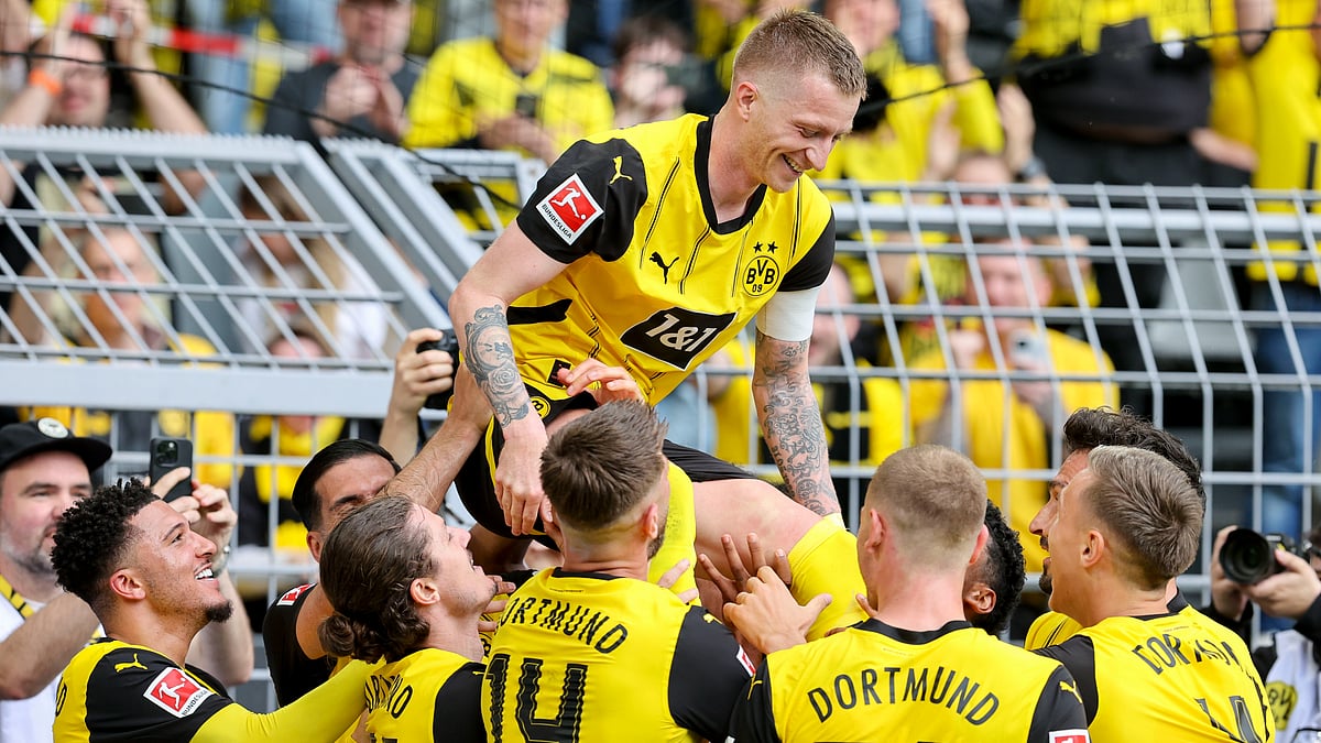 Marco Reus celebrates after scoring on his final Bundesliga outing for Borussia Dortmund.