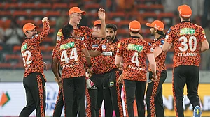 AP Photo/Mahesh Kumar A. : Sunrisers Hyderabad's Bhuvneshwar Kumar, centre, celebrates with teammates the wicket of Rajasthan Royals' Jos Buttler during the Indian Premier League cricket match between Sunrisers Hyderabad and Rajasthan Royals in Hyderabad.